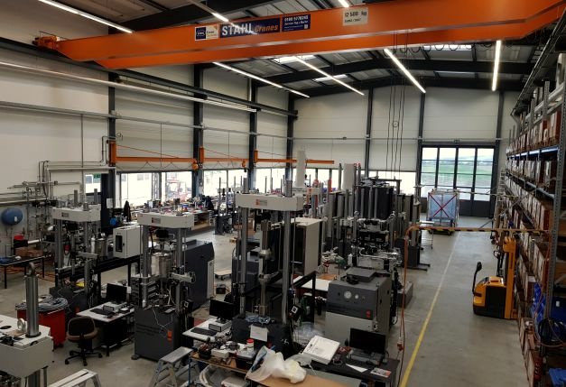 Assembly hall with overhead crane and testing frames under construction